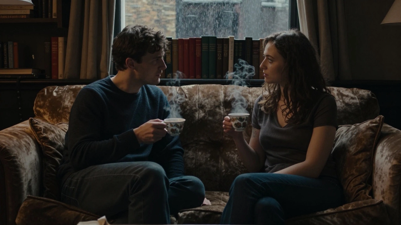 Two people sitting quietly across from each other in a London flat, sharing tea with deep eye contact.